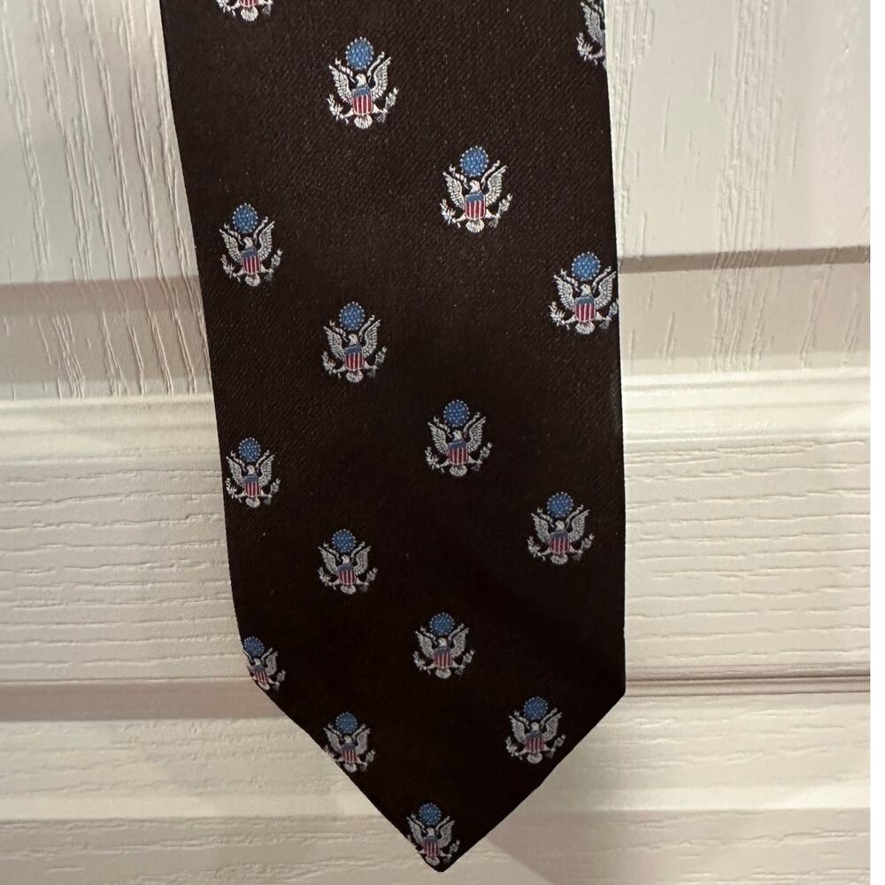 Jos A Bank American Eagle tie Brown background